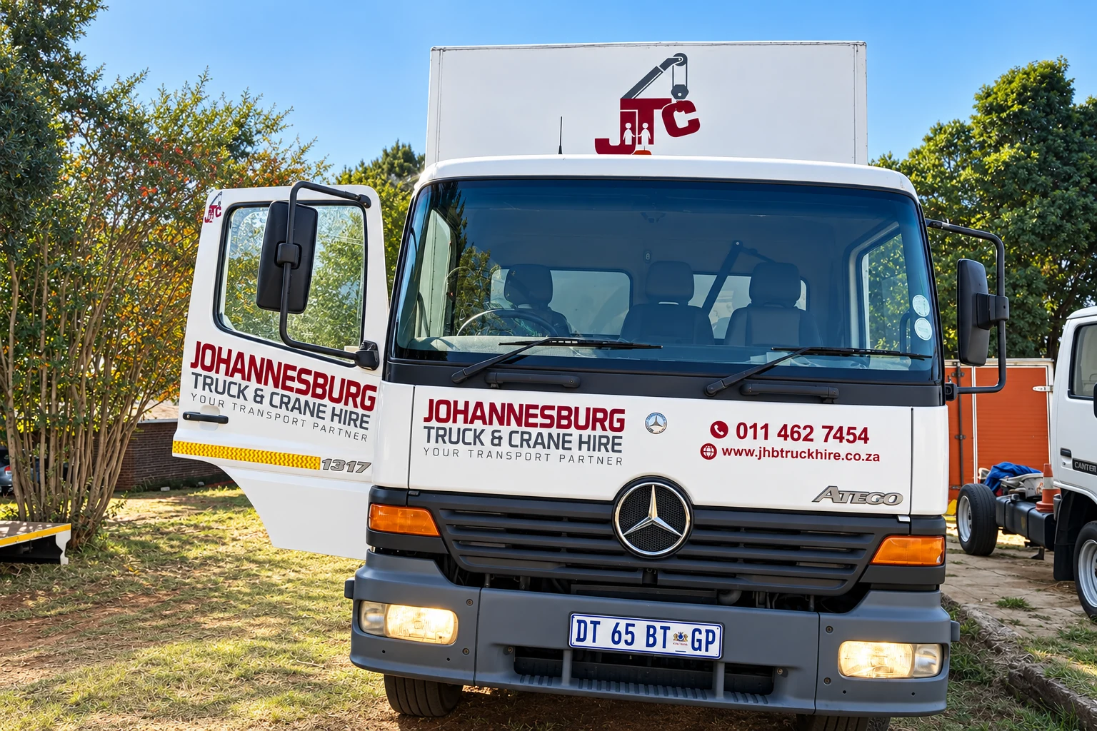 Enhanced JTC branded small truck in the fleet yard