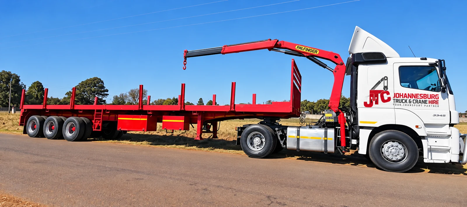 Enhanced JTC horse with a red flatbed and truck-mounted crane