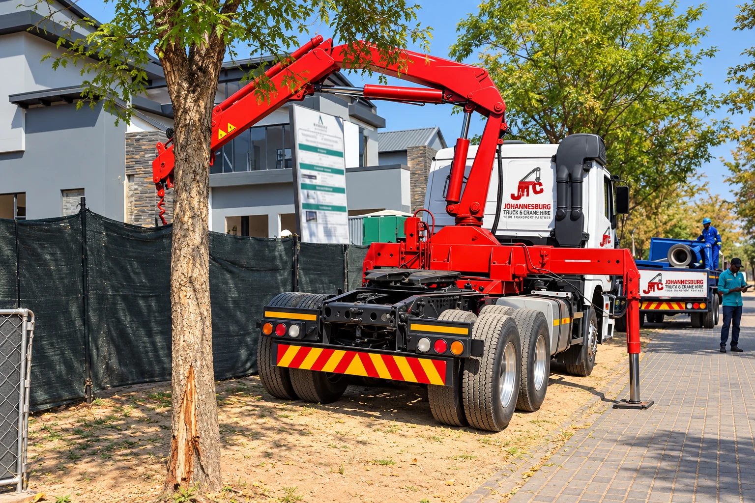 Enhanced JTC truck-mounted crane working beside residential premises