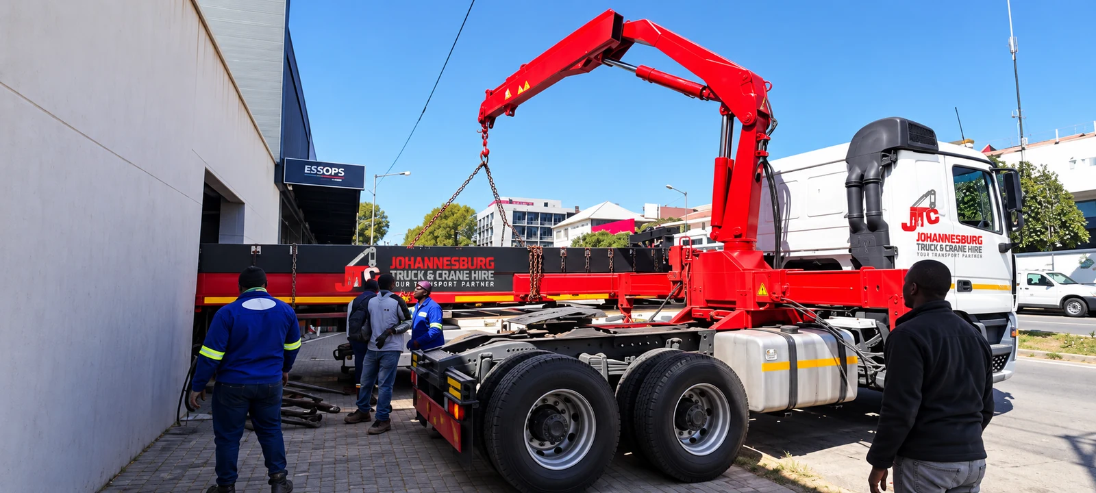 Enhanced JTC truck-mounted crane working at industrial premises